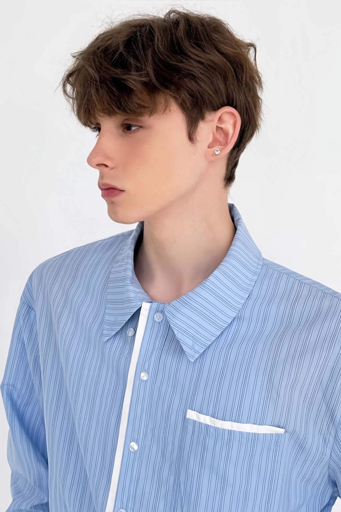 قميص تياغوي أزرق مخطط