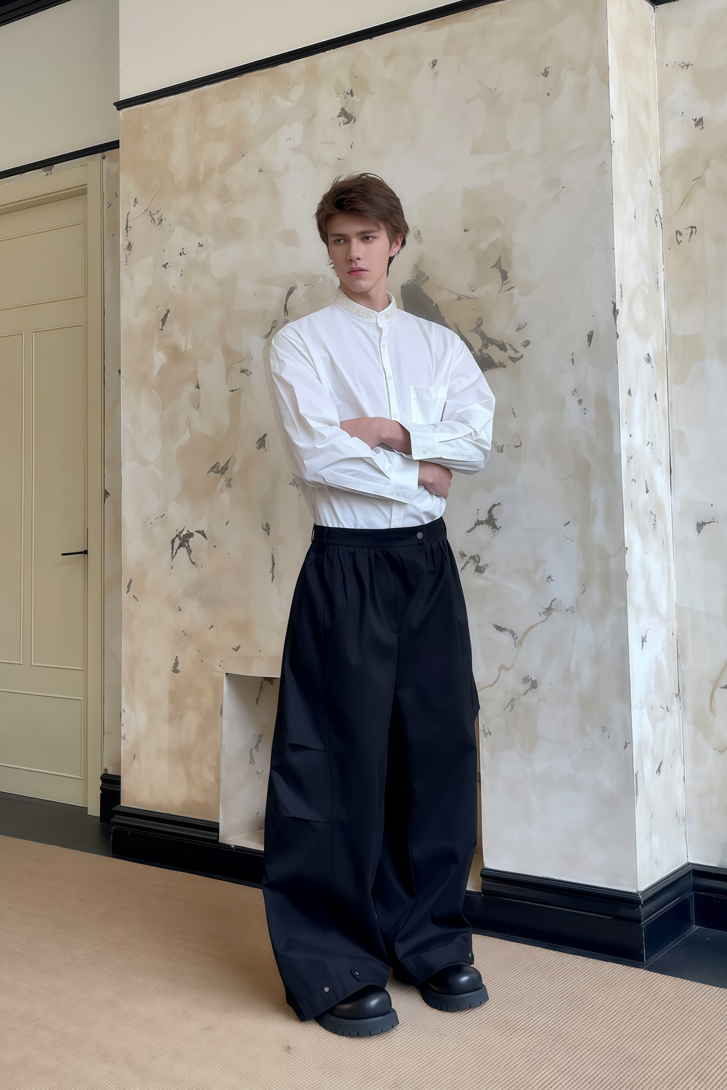 Pierre black pleated wide-leg trousers