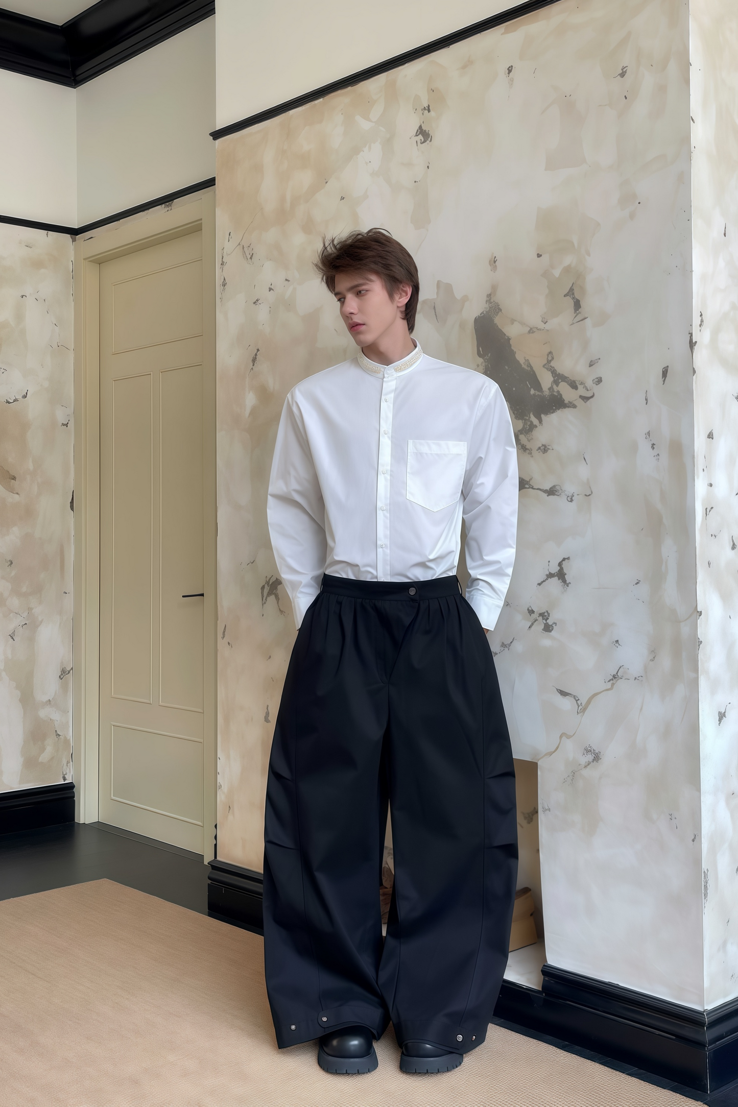 Pierre black pleated wide-leg trousers